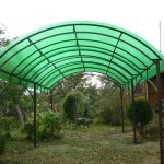 Arched canopy with colored polycarbonate roof