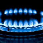 Why does the electric ignition of a gas stove constantly click?