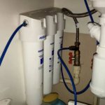 Water filter installed under the kitchen sink